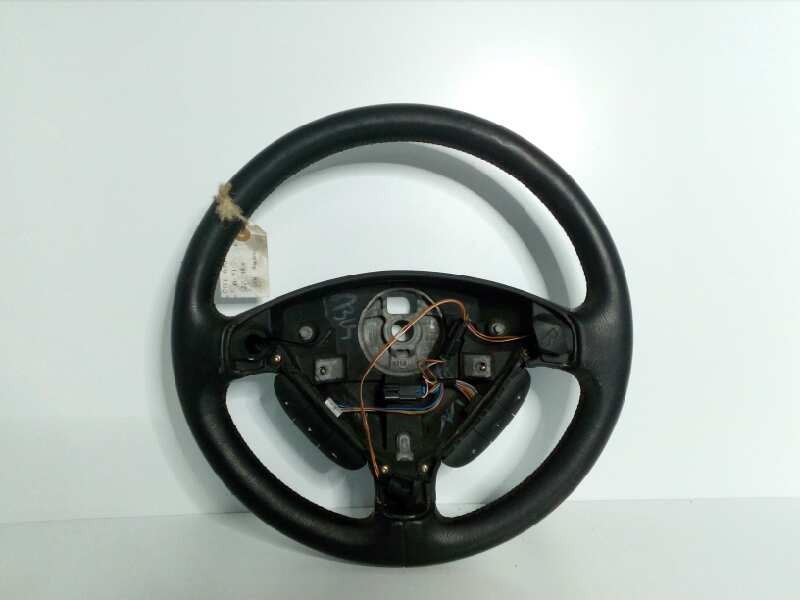 Recambio de volante para opel astra f berlina referencia OEM IAM 090538275 CUERO 