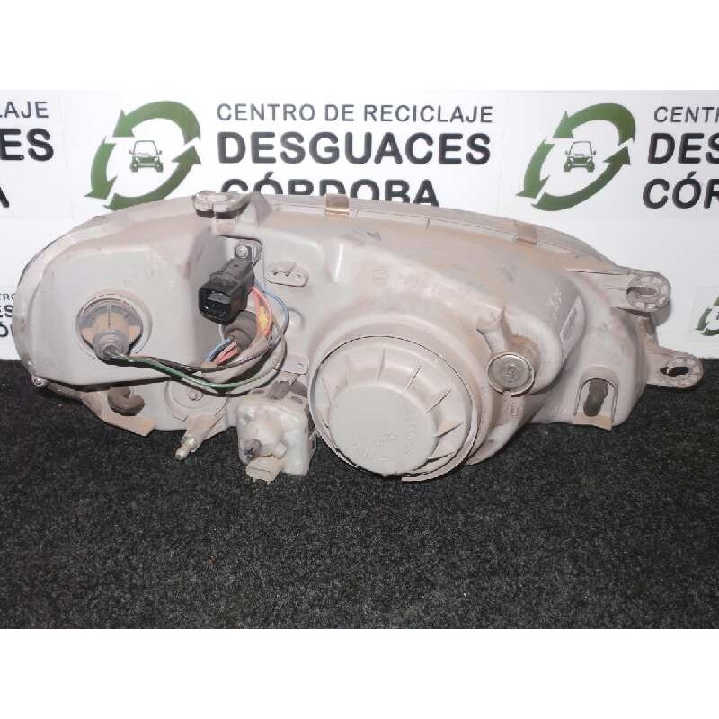 Recambio de faro izquierdo para kia carnival 2.9 turbodiesel cat referencia OEM IAM  99-01 