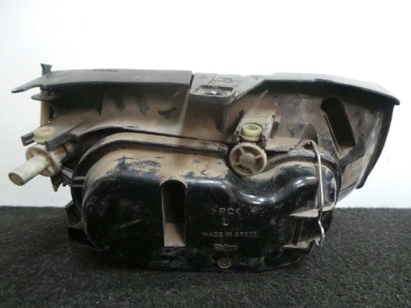 Recambio de faro izquierdo para volkswagen polo berlina (6n2) 1.4 16v referencia OEM IAM  00-02 TRANSPARENTE