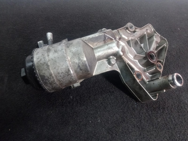 Recambio de soporte filtro aceite para opel astra gtc 1.9 cdti referencia OEM IAM 6740230110  