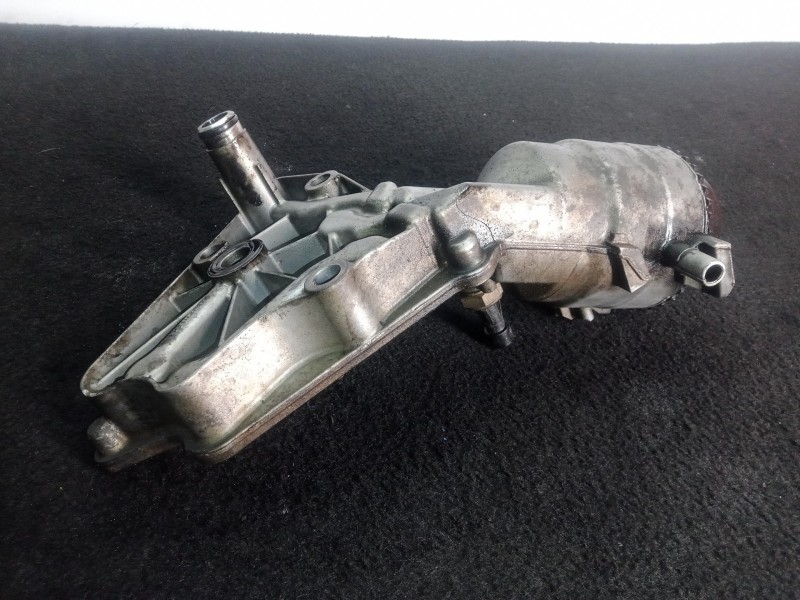Recambio de soporte filtro aceite para opel astra gtc 1.9 cdti referencia OEM IAM 6740230110  