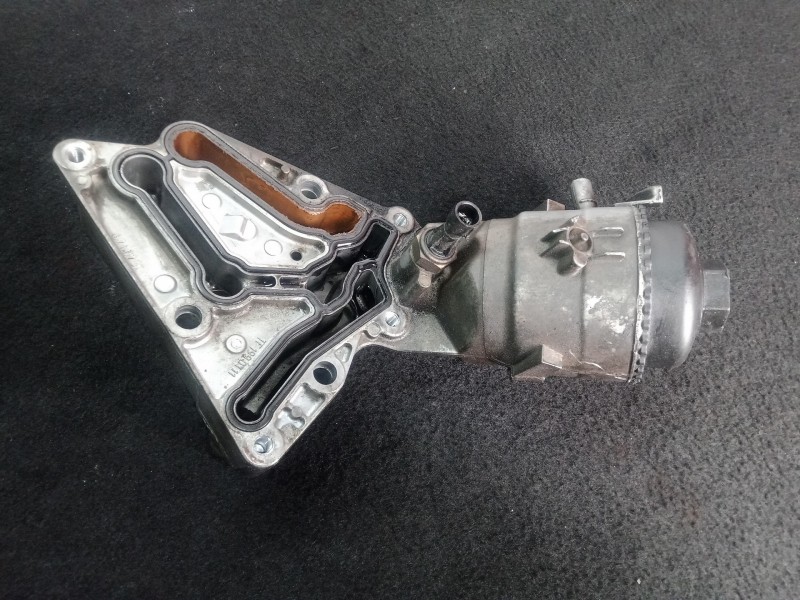 Recambio de soporte filtro aceite para opel astra gtc 1.9 cdti referencia OEM IAM 6740230110  