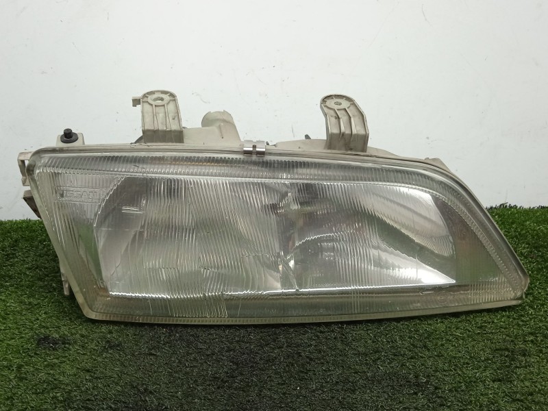 Recambio de faro derecho para nissan primera (p11) 2.0 td referencia OEM IAM   96-99