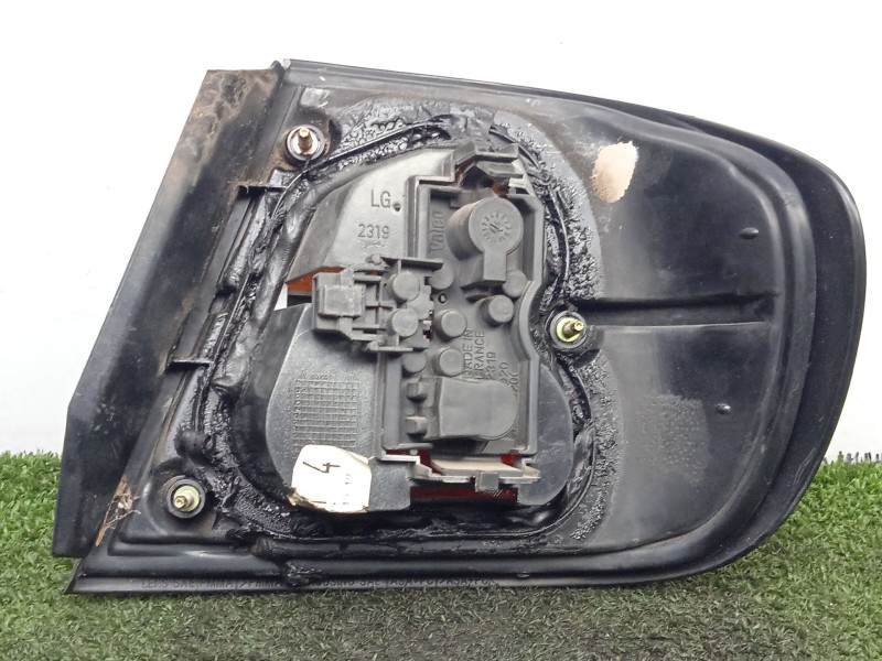 Recambio de piloto trasero izquierdo para nissan primera (p11) 2.0 td referencia OEM IAM 23190104  96-99 - AMBAR