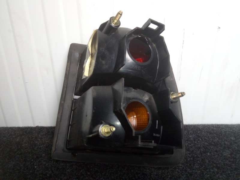 Recambio de piloto trasero izquierdo para seat toledo (1l) 1.6 referencia OEM IAM  ROJO/NEGRO EXTERIOR - SIN.PORTALAMPARAS