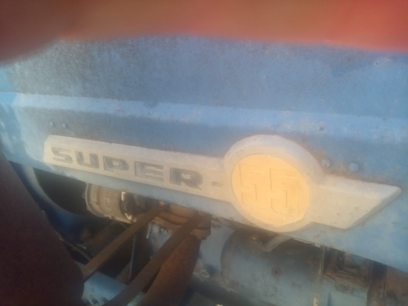 Recambio de moldura para ebro super 55 tractor referencia OEM IAM EMBLEMA EBRO  DELANTERO IZQUIERDO