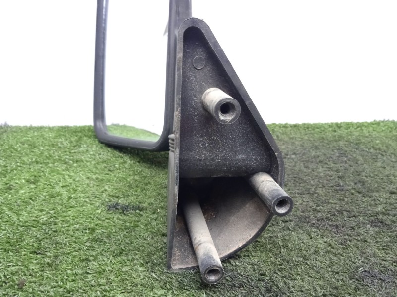 Recambio de retrovisor izquierdo para nissan trade caja/chasis 2.8 d referencia OEM IAM 0140050  MANUAL