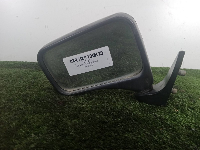 Recambio de retrovisor izquierdo para seat 131 1.4g referencia OEM IAM SIN REFERENCIA NEGRO.PLASTICOG MANUAL