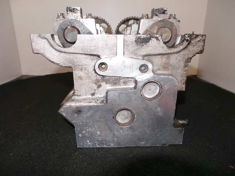 Recambio de culata para opel calibra 2.5 v6 cat (l80) referencia OEM IAM 90412231  