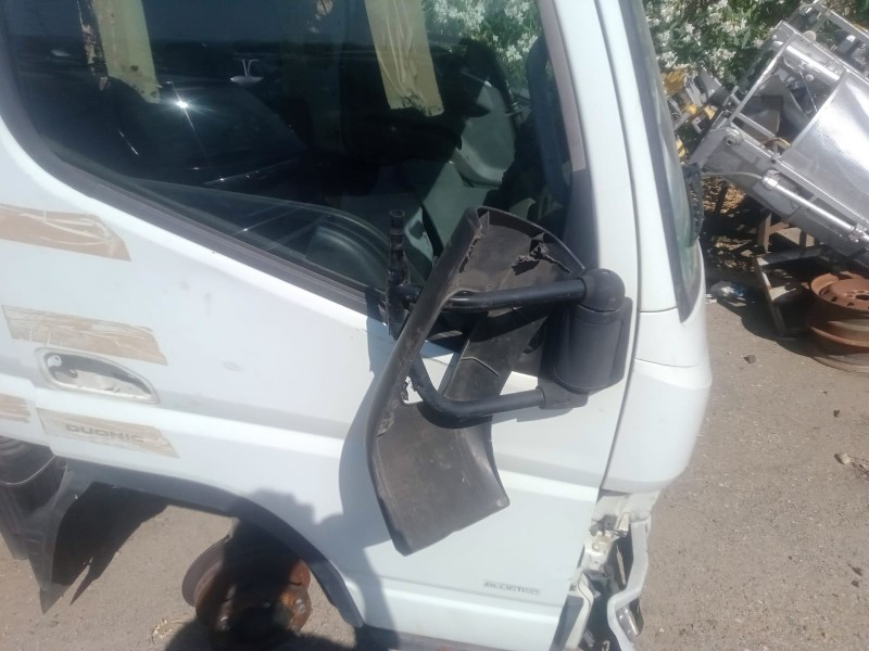 Recambio de puerta delantera derecha para fuso (mitsubishi) canter 7c18 referencia OEM IAM   