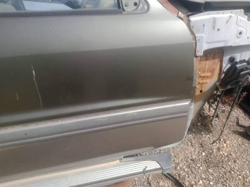 Recambio de puerta delantera derecha para nissan patrol gr (y61) 2.8 turbodiesel cat referencia OEM IAM   