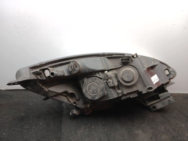 Recambio de faro izquierdo para renault scénic iii (jz0/1_) 1.2 tce referencia OEM IAM 89906003 - 260601946R  