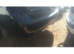 Recambio de paragolpes trasero para kia carens (un) 2.0 crdi referencia OEM IAM  NEGRO CON SENSORES 2