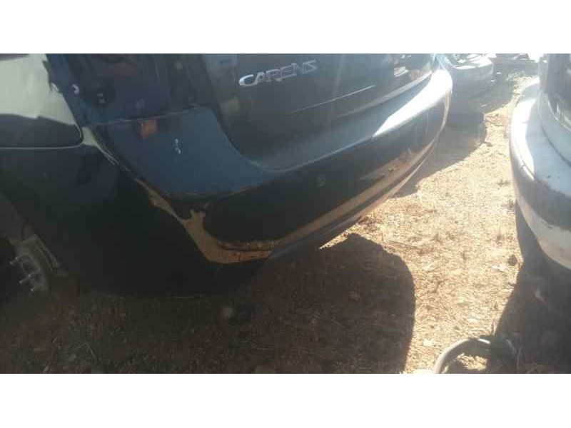 Recambio de paragolpes trasero para kia carens (un) 2.0 crdi referencia OEM IAM  NEGRO CON SENSORES