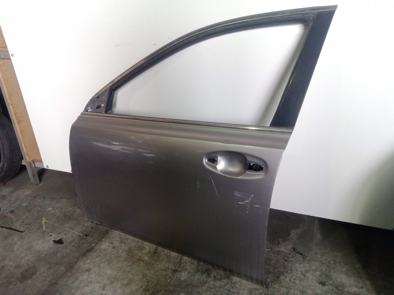 Recambio de puerta delantera izquierda para subaru legacy kombi/outback b14 2.0 diesel cat referencia OEM IAM   