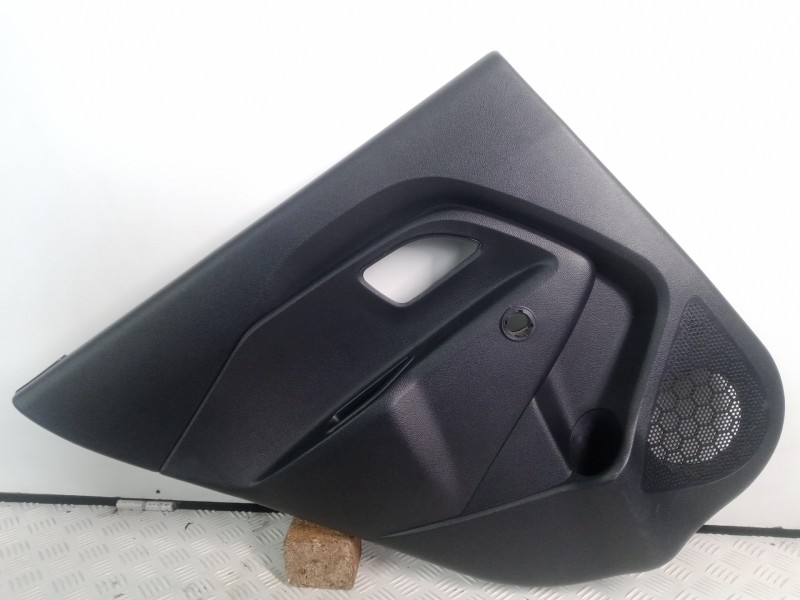 Recambio de guarnecido puerta trasera izquierda para kia rio 1.2 cat referencia OEM IAM 833011W200HU  