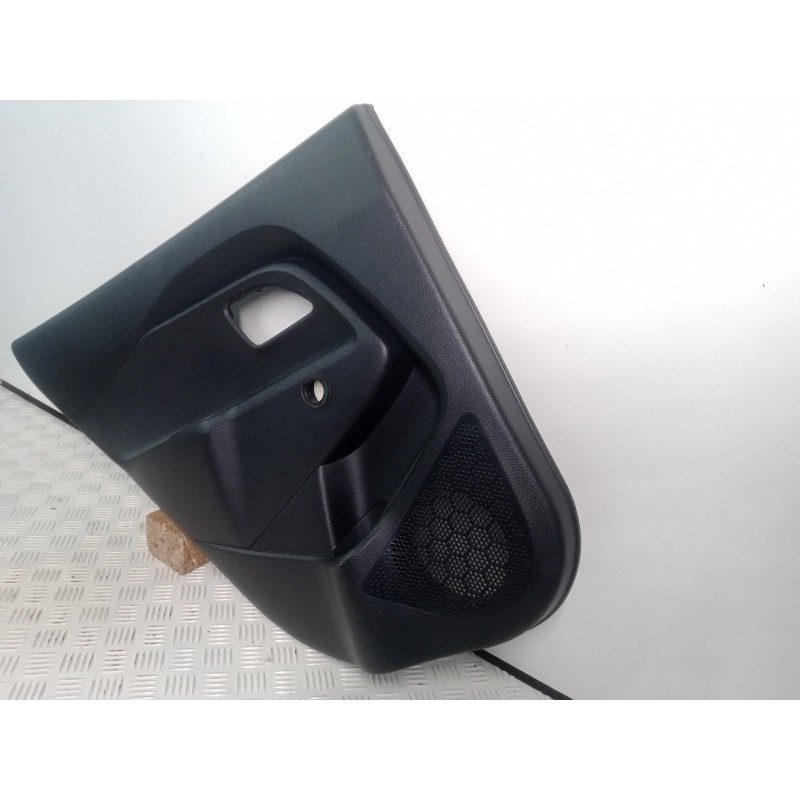 Recambio de guarnecido puerta trasera izquierda para kia rio 1.2 cat referencia OEM IAM 833011W200HU  
