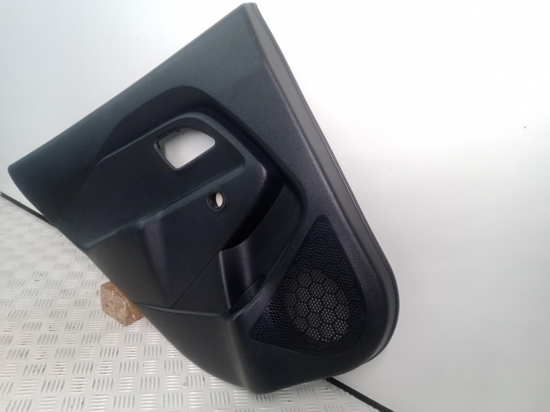 Recambio de guarnecido puerta trasera izquierda para kia rio 1.2 cat referencia OEM IAM 833011W200HU  