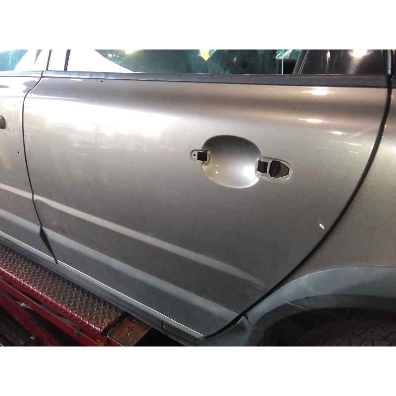 Recambio de puerta trasera izquierda para volvo xc70 2.4 diesel cat referencia OEM IAM   