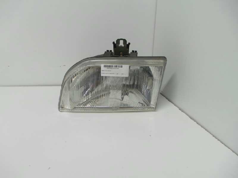Recambio de faro izquierdo para ford fiesta berlina 1.3 cat referencia OEM IAM  FIESTA 90. 