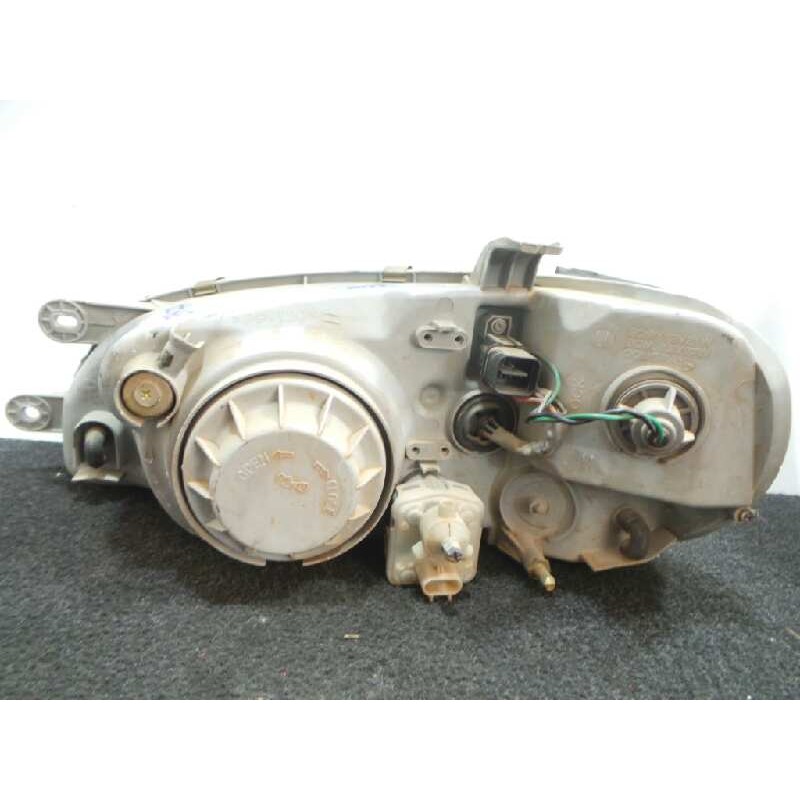 Recambio de faro derecho para kia carnival referencia OEM IAM  99-01 