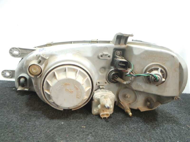 Recambio de faro derecho para kia carnival referencia OEM IAM  99-01 