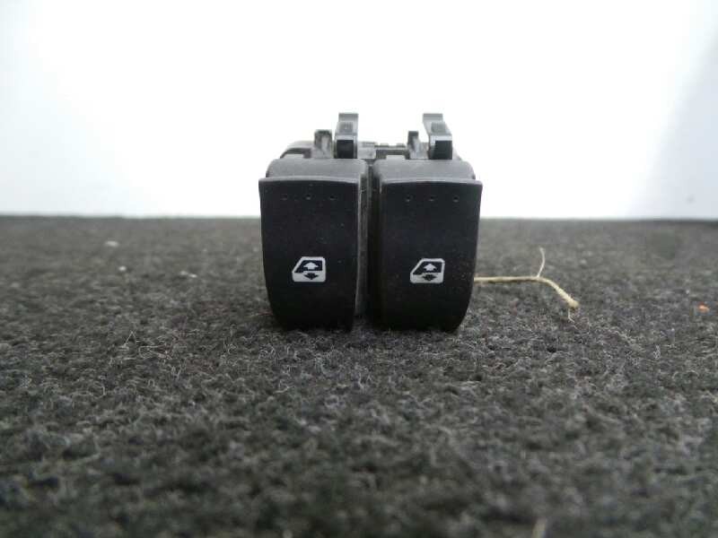 Recambio de mando elevalunas delantero izquierdo para renault laguna ii (bg0) referencia OEM IAM  CLAVIJA MARRON 2 BOTONES